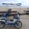 A Two Person Surrey along the beach