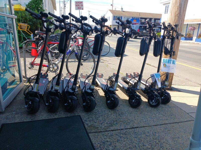 A row of X8D electric scooters with upgrades